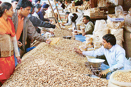 With Lohri round the corner, residents make a beeline for shops selling delicacies in Chandigarh on Tuesday.