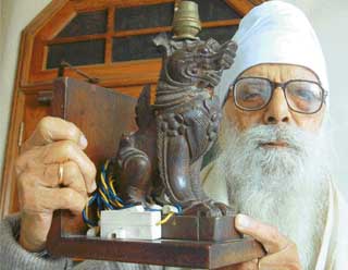 Dr Mohinder Singh with his treasure a memento he brought back from Burma in 1940.