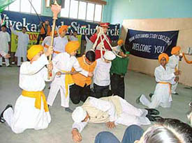 Students present a cultural item during the National Youth Day celebrations at Arya
