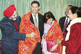 The PAU Vice-Chancellor, Dr K.S. Aulakh, presents a traditional Punjabi phulkari to Mr Narend Singh, a minister in the South African province of Kwaazulu Natal, during his visit to the university in Ludhiana on Wednesday. 