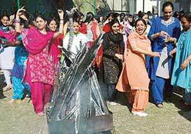 Students of Dev Samaj College of Education, Sectror 36, celebrate Lohri on college premises, in Chandigarh on Thursday. 