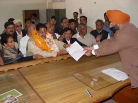 BJP candidate from the Karnal Assembly constituency Shashi Pal Mehta files his nomination papers in Karnal on Thursday