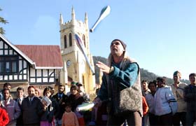 Mr Martin Habn from Germany collects relief for his friend, who lives in the Nicobar Island and suffered during the tsunami waves, at the Ridge in Shimla