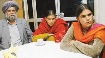 Mandeep Kaur with her parents.