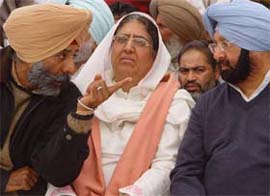 Mr Jagmeet Singh Brar, a former Congress MP, and the Chief Minister, Capt Amarinder Singh, during a political conference at the Maghi Mela in Muktsar