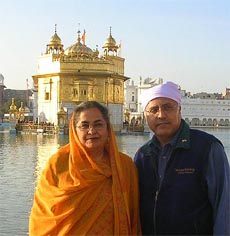 Mr Ujjal Dosanjh, Health Minister of Canada, poses alongside his wife Ms Raminder Dosanjh outside the Golden Temple in Amritsar