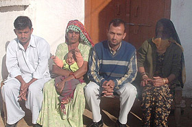 Winner of the Rs 1.5-crore Lohri Bumper, Banwari Lal, with his family members inside their one-room house at Sayeedwala village, near Abohar