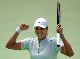 Australias Alicia Molik celebrates after beating compatriot Samantha Stosur in the final of the Sydney International tennis tournament on Saturday