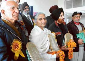 (from left) Shivnath, Rama Rattan, Sarabjit Bedi and Hardev Chauhan, the four Shiromani awardees being honoured by the Sahit Sabha, Mohali