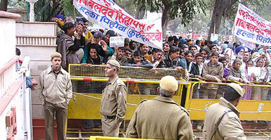 Supporters of rebel Congress leaders from Haryana demonstrate at the Congress headquarters in New Delhi