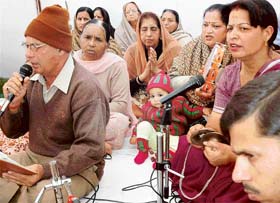 Devotees take part in a Sankirtan on the first installation day of Sanatan Dharam Mandir in Sector 45, Chandigarh