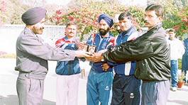 The AOC, 3 BRD, Chandigarh, Air Cmde S.P.S. Virk, presents Vital Trophy to the depot coaches.