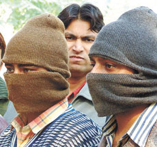 Tajender Singh and Surender, arrested by the South-West district police in the Capital on Monday.