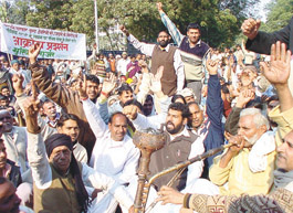 Dairy owners protesting against shifting of dairies under the banner of Pathik Sena at Jantar Mantar in the Capital on Tuesday. 
