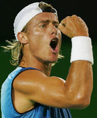 Lleyton Hewitt of Australia reacts during his first round match against Frances Arnaud Clement at the Australian Open tennis tournament in Melbourne on Tuesday