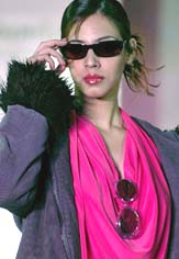 A model displays winter sunglasses collection launched by various designer brands in New Delhi on Tuesday night.