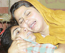 Artistes perform in a play