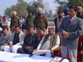 Mr Tenzin Vengyal, Director of the state commission for the SC and ST, introduces Mr Faquir Bhai Vaghela to villagers at Patrewala village