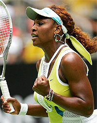 Serena Williams of the US celebrates after winning her second round match against Madagascar's Dally Randriantefy at the Australian Open in Melbourne on Wednesday