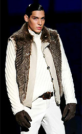 A model presents a creation as part of Valentino's Fall/Winter 2005/2006 men's collections during Milan fashion week on Wednesday