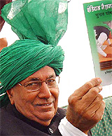 Haryana Chief Minister Om Prakash Chautala releases the INLD manifesto in Chandigarh on Thursday