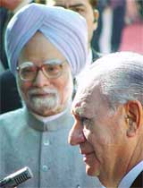Chilean President Ricardo Lagos (right) and Prime Minister Manmohan Singh talk to mediapersons during a welcome ceremony at Rashtrapati Bhavan in New Delhi on Thursday. 