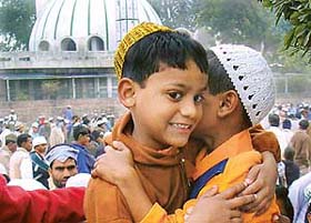 Children hug each other on the occasion of Id-ul-Zuha outside the Sector 20 Jama Masjid in Chandigarh