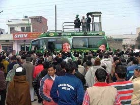 Chief Minister Om Prakash Chautala atop his vijay rath addresses a public meeting in support of INLD candidate Sahib Singh in Yamunanagar on Friday