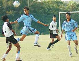 Gurdeep Singh of Mehar Academy, Kurali, attempts a header during their tie against DAV School, Sector 8, in the Chandigarh Junior Challenge Football Cup Tournament held on Saturday at the Sports Complex, Sector 42, Chandigarh. 