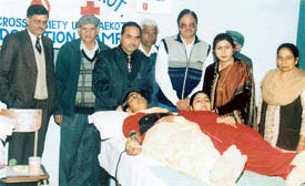 Students donate blood at a camp at Swami Ganga Giri Janata Girls College, in Raikot near Ludhiana