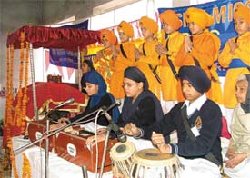 Students of Sikh Missionary Public School recite Shabad at the school function
