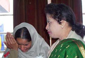 Ms Lakshami Hari Prashad consoles the wife of soldier Jaspal Singh, who was awarded the Sena Medal posthumously