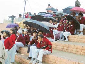 Despite rain and chilly weather, students of various schools rehearse for the Republic Day function at Nehru Stadium in Ropar