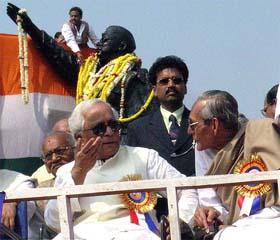West Bengal Chief Minister Buddhadeb Bhattacharjee with Subrata Bose, a nephew of Netaji Subash Chandra Bose, at the 108th birth anniversary celebrations of Netaji in Kolkata