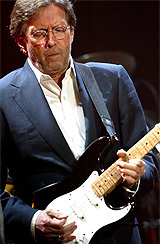 Eric Clapton performs at the tsunami relief concert at the Millennium Stadium in Cardiff
