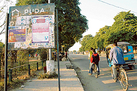 Posters pasted on a PUDA guide map