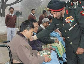 General Officer Commanding-in-Chief, Western Command, Lieut-Gen J J Singh, interacts with inmates of Paraplegic Rehabilitation Centre at Mohali
