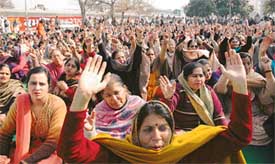 Teachers of government-aided schools from different districts hold a protest against the withdrawal of the pension scheme, at the Chattar Singh park in Ludhiana
