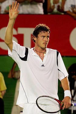 Russias Marat Safin waves after winning his quarter-final match against Slovakias Dominik Hrbaty at the Australian Open in Melbourne on Tuesday