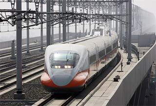 Taiwan's first bullet train arrives at the platform in the southern county of Tainan on Thursday in a test run before its scheduled operation in October