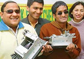 Visually handicapped students are all smiles after they were presented with shorthand machines and Braille slates by the Dr Amrik Singh Cheema Trust Foundation in Sector 9, Chandigarh