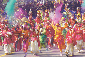 Schoolchildren performing a Holi dance during the Republic Day Parade in the Capital on Wednesday.