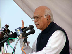 BJP President addresses a public meeting at Agroha on Thursday in support of the party nominee from the Bhattu constituency.