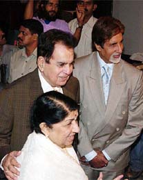 Legendary singer Lata Mangeshkar, veteran actor Dilip Kumar and Amitabh Bachchan at the golden jubilee celebrations of Filmfare Awards in Mumbai on Thursday. 