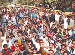 Protesting auto-rickshaw drivers at Rajghat.
