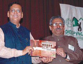 Dr Bindeshwari Pathak, founder of Sulabh International and T.K. Mathew, president, Deepalaya, releasing a book during a symposium on Partnership for Change, at India International Centre in the Capital.
