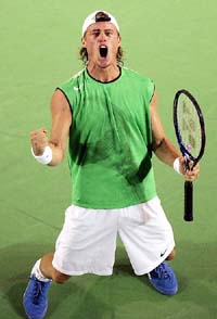 Third seed Lleyton Hewitt of Australia celebrates his semifinal win over second seed Andy Roddick of the USA at the Australian Open in Melbourne