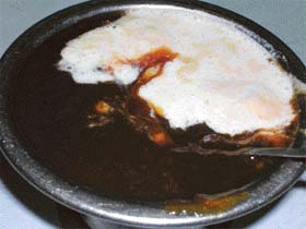 Khubani ka meetha should be served with cream.