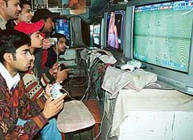 Children play video games at the Sector 37 market in Chandigarh