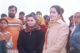Ms Kiran Chaudhary campaigns for her husband Surender Singh, Congress candidate from Tosham, at Malwas village on Monday